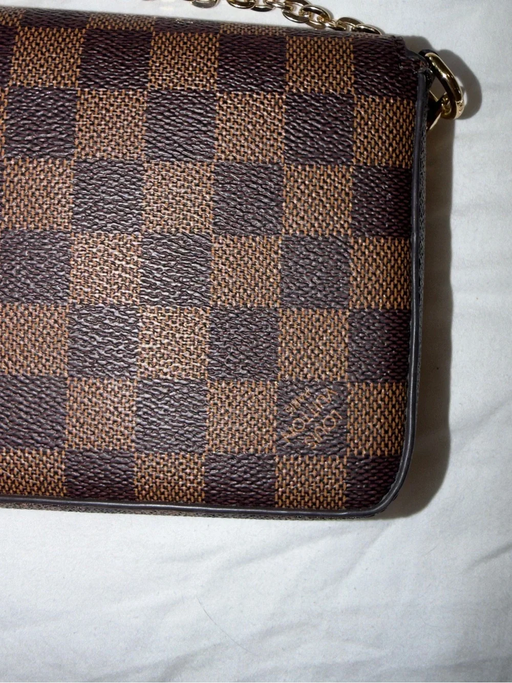 Brown and black checkered wristlet /crossbody